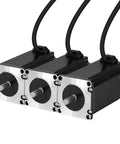 Three black NEMA 23 stepper motors with silver front plates and attached cables