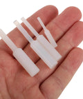 Top Pick 20 Piece High Temp Silicone Plug Straight Hole Stopper Kit Perfect For Powder Coating And Spray Painting Jobs Featuring Durable Round Open Design For Easy Insertion And Removal To Keep Dust Out And Holes Secure On Any Project. White silicone straight hole stoppers in hand