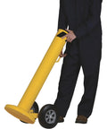 Heavy Duty Movable Safety Bollard With Durable Casters For Warehouse Workshop Protection 42 Inch Tall being moved by a worker.