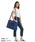 Person holding Spirit Airlines Underseat Personal Item Bag 18x14x8 With Wet Pocket And Shoe Compartment Duffle Navy Blue