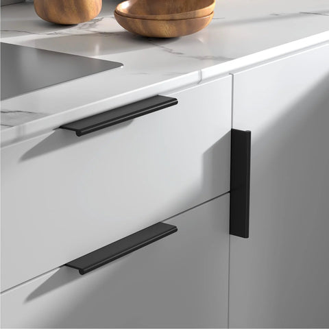 20 Pack Black Cabinet Pulls Five Inch Edge Finger Pulls Aluminum Alloy Hardware installed on white kitchen cabinets