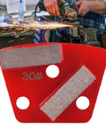 Set Of 3 Trapezoid Concrete Grinding Discs With 30 Grit for floor grinders, shown with angle grinder in use