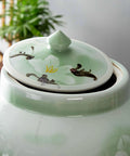 Slay Your Pantry Game With This Knockout Green Ceramic Rice Jar Featuring Hella Secure Airtight Lid, top view with floral design.