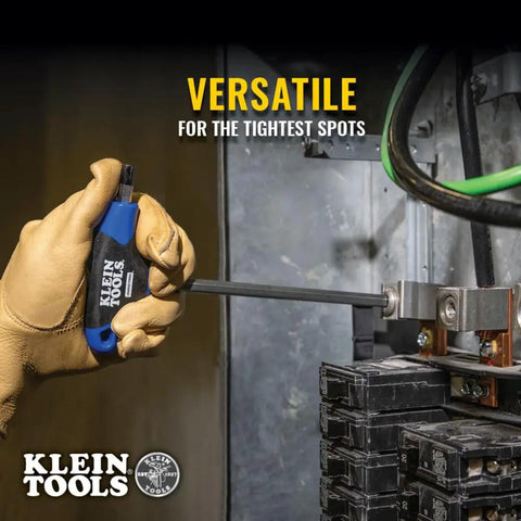 Hand using Eight-Piece T-Handle Hex Key Set With Six Inch Blades to tighten electrical panel screw, showing versatility