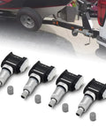 Plug N Play Tire Pressure Sensor Module For Chevy Silverado Gmc Sierra Heavy Duty Trucks And Travel Trailers close-up view of four units with valve stems.