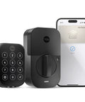 Slick Black Smart Keyless Entry Door Lock With Apple Home Keys And Smooth Keypad Access Auto Unlocks Via Express Mode For iPhone And Apple Watch HomeKit Ready Hardware next to a smartphone.
