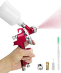 Heavy Duty Air Spray Gun With A Snazzy 600Cc Cup And Precise 1.5Mm Tip being used to spray out paint for DIY projects.