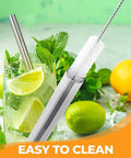 Close-up of straw and brush from 12 Inch Stainless Steel Straws Replacement Set, Four Pack With Cleaning Brush, in a drink with fruit