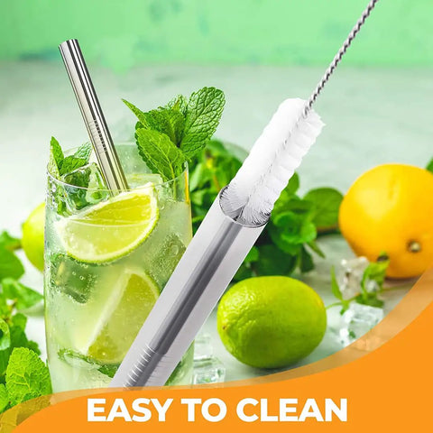 Close-up of straw and brush from 12 Inch Stainless Steel Straws Replacement Set, Four Pack With Cleaning Brush, in a drink with fruit