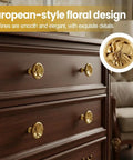 Two Pack Zinc Alloy Cabinet Knobs With Floral 3D Design shown on a wooden dresser enhancing royal luxury style