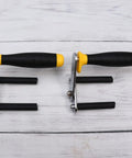 One Pair Hella Strong Grip Gypsum Board Lifter Portable Ceramic Tile Suction Cup And Glass Moving Tool With Rubber Alloy Handles on a wooden surface.