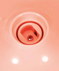 Close-up of the drain opening in the Real Talk Mini Washing Machine That Kills Your Laundry Hustle Usb Powered Little Buddy.