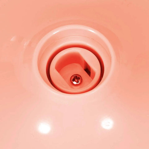 Close-up of the drain opening in the Real Talk Mini Washing Machine That Kills Your Laundry Hustle Usb Powered Little Buddy.