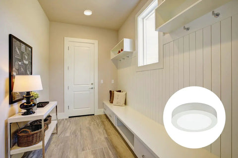 Slick 4 Inch Led Ceiling Light Low Profile Surface Mount Downlight Wet Rated Matte White Trim in a modern entryway.