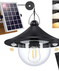 Kick Up Your Backyard Vibe With This Dope Solar Shed Light Featuring Dual Motion Sensors For Indoor And Outdoor Use With Smart Day And Night Modes To Keep The Space Lit Solid And Ready For Any Project Without Breaking The Bank. Black solar shed light with dual motion sensors and remote.