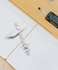 Heavy Duty Toggle Anchors Kit For Brick Walls And Shelves with galvanized screw and screwdriver on wooden surface.