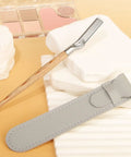Get Your Brows In Tip Top Shape With This Manual Eyebrow Shaper Trimmer Featuring A Wooden Handle And Safety Mesh Guard For Dead On Facial Hair Removal For Men And Women Plus Stainless Steel Refills, displayed with a gray case.