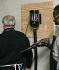 Man demonstrating Industrial Air Blaster For Quick Kickin It Clean Cleanup Of Clothes Surfaces Electronics And Car Interiors