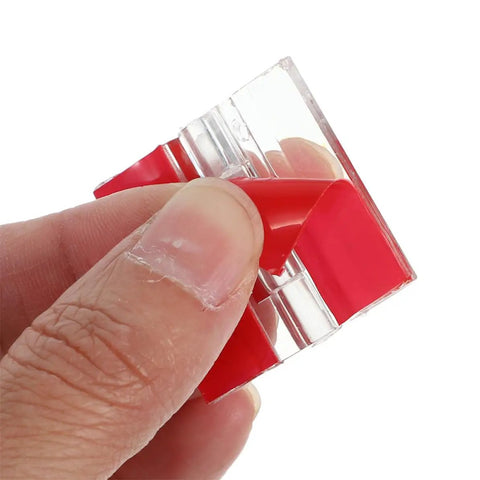 Close-up of Self Adhesive Acrylic Cabinet Door Hinges 6pcs Folding Plastic Hinges 35x25mm with red adhesive being peeled