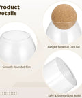 Airtight spherical cork lid on clear glass jar showcasing smooth rounded rim, a feature of the Straight Up Kitchen Essential Four Piece Glass Jar Collection With Airtight Spherical Cork Lids To Lock In Coffee Tea Candy Freshness And Effortlessly Organize Pantries No Fuss.
