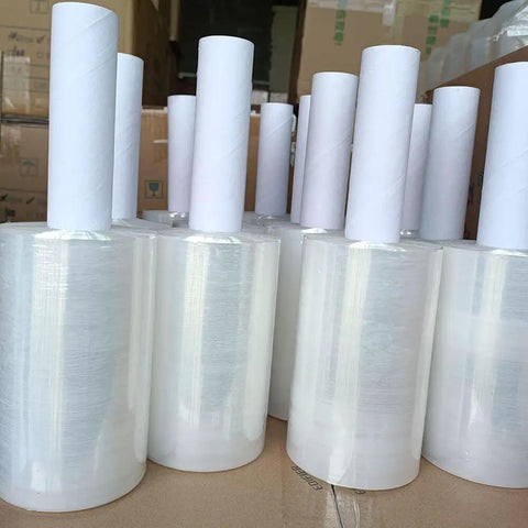Top Shelf Clear Stretch Wrap 6 Inch By 1000 Feet Plastic Roll stacked for moving, shipping, and packing heavy items.