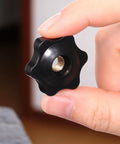Twenty Count One Quarter Twenty Thread Star Knobs Durable Nylon Thumb Screws With Solid Brass Insert held in hand