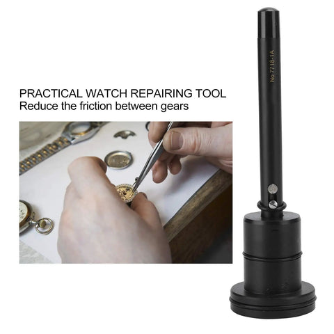 Automatic Watch Oiler Pen for Pro Grade Watch Repair Self Oiling Tool beside watchmaker's hand using tweezers on gears