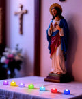Statue with colorful Flickering Flameless LED Tea Lights 24 Pack Battery Operated For Wedding Centerpieces And Home Decor