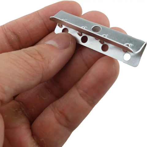 Hand holding 20 Pack Metal End Clips For Rubber Webbing 2x1/2 Inch With Screws Heavy Duty Chair Upholstery End Clips