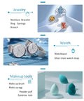 Portable Stainless Steel Ultrasonic Cleaner Blast Grime Off Rings Necklaces Glasses Watches And Coins With A Roomy 20oz Tank That Cleans As A Whistle Daily displayed with various cleaned glasses and jewelry.