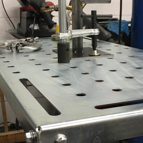 Rust Free 36 By 18 Inch Welding Table With 1200 Pound Load Capacity, work cart and clamps, five eighth inch holes, metal surface