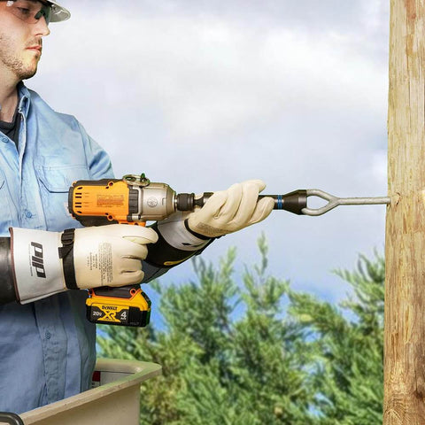 Worker using 5-In-1 Impact Socket Kit Heavy-Duty With 3/4 Inch 1 Inch And 1-1/8 Inch Square Sockets outdoors on utility pole.