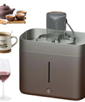 Slick Desktop Electric Glass Rinser With Hella Strong Jets For Spotless Tea Cups And Glasses No Plumbing Required No Sweat One Point Eight Liter Fill Fast Cleanup For Home Or Bar Everyday Use with a tea pot and cups.