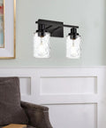 Two-light vanity fixture with hammered glass shades and brushed brass for bathroom over mirror, industrial wall light sconces.
