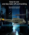 Dope UH 1 Huey RC Helicopter 1/48 Scale 6CH Gyro Stabilized With Altitude Hold hovering in a cityscape backdrop.