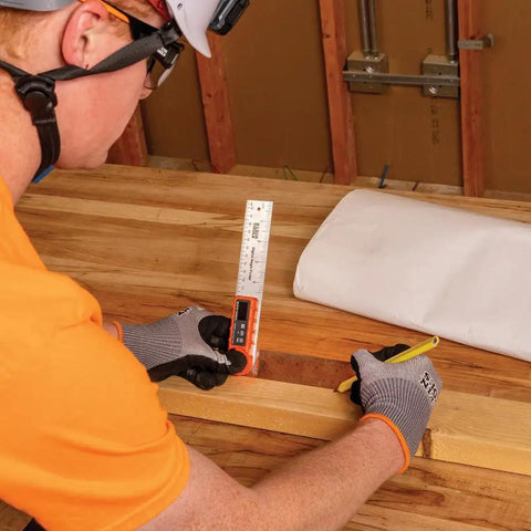 Craftsman using Digital Angle Finder 3 In 1 For Inside And Outside Angles, Lengths, And Miter Saw Protractor Angle Calculation on wood.