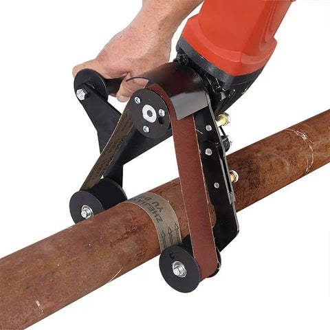 Upgrade Your Angle Grinder With This Durable Belt Sander Adapter in use on a metal pipe, featuring a rubber grip and mixed alloy build.
