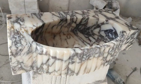 Straight Up Solid Hand Carved Arabescato Marble Wall Mount Sink With Polished Fluted Stone Vanity Basin top view showcasing its elegant design.