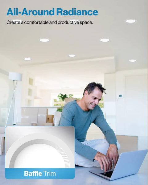 Man working on laptop beneath 16 Pack 6 Inch LED Recessed Lights With Junction Box, Ultra Slim Canless Ceiling Lights, Baffle Trim.