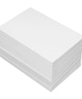 Stack of white vinyl sheets from the 20 Piece Scratch Resistant Vinyl Smoothing Tool Kit For Phone Screen Protector Car Window Tint Wallpaper Mural Application With No Sweat Usage And Tough As Nails Grip Corners.