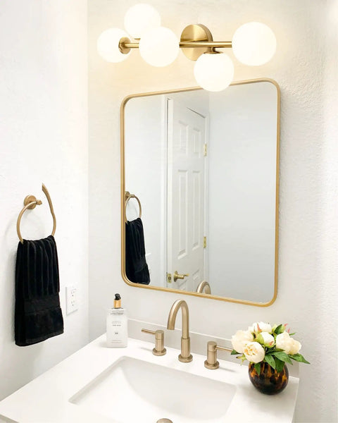 Five Light Bathroom Vanity Light Fixture With Milk Glass Globes In Brass Finish For A Slick Mid Century Modern Look
