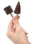 Hand holding two pieces from the Twenty Piece Pro Grade Abrasive Flap Wheel Sander Set With Eight Flap Wheel Sizes And Two Cone Shapes, 80 Grit.