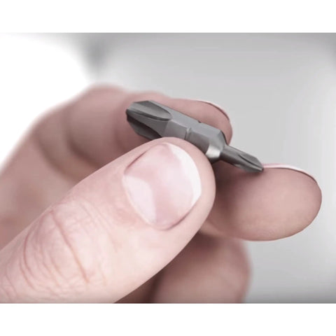 Close-up of a hand holding a double-ended insert from Ultra Driver 14 Piece 26 In 1 Bit Holder Set With 13 Double Ended Inserts