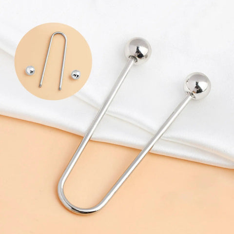 Two Pack Metal Spiral Fasteners Double Head Brooch Clips Secure Clothing And Shawl Collars Keeping Loose Garments Locked Down With Zero Drama, silver U-shaped fasteners on fabric.