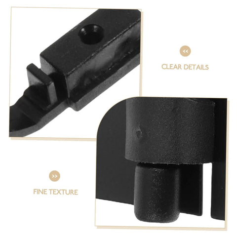 Close-up view of black metal piece in heavy-duty sliding door roller kit for effortless sliding door upgrade with a heavy duty roller and track kit that installs easily, supports high loads, keeps wardrobes and barn doors quiet and stable, and delivers smooth operation for cabinets, showing fine texture and details.