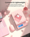 Killer Digital Postal Scale Measures Every Package Up To 66 Pounds With Dead On Precision So You Can Ship Heavy Goods Without Stress While The Sleek Pink Surface Looks Absolutely Dope on a desk with pink accessories. 