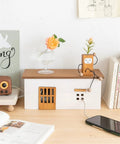 Wooden Cable Management Box For TV And Computer Setup Hidden Cord Organizer holding decor items.