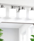Four Light Brushed Nickel Vanity Light with square frosted glass modern bathroom wall fixture over mirror E26 sconce view