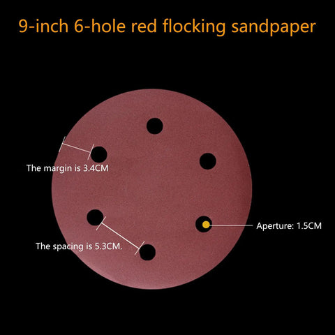 Rock Solid 50 Pack Of 9 Inch Aluminum Sanding Discs With 6 Holes And Hook Loop Backing, showing detail of sandpaper holes.