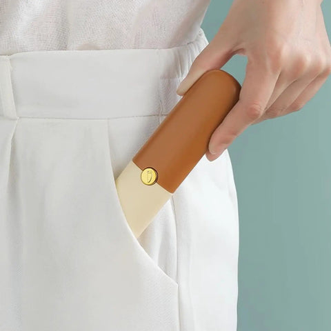 Person pocketing Stainless Steel Fruit Peeler Knife For Kitchen And Camping Use, Portable Double Head With Orange Handle, in pocket